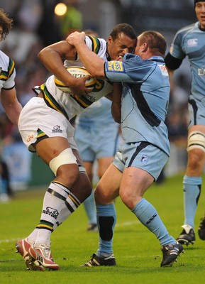 29.08.08 - cardiff Blues v Northampton Saints Northampton's Courney Lawes is tackled by Gareth Williams 