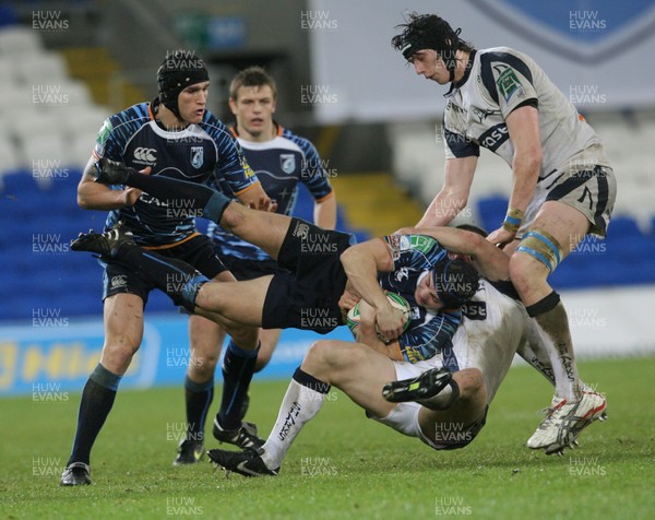 16.01.10. Cardiff Blues v Sale Sharks... Cardiff Blues' Leigh Halfpenny is tackled by Sale Sharks' Ben Cohen. 