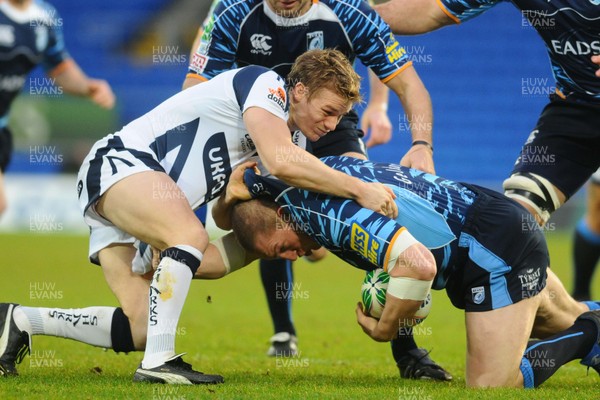 15.01.10 - Heineken Cup Rugby, Group 5, Cardiff Blues v Sale Sharks Cardiff Blues' Gethin Jenkins is tackled by Sale Sharks' Dwayne Peel 