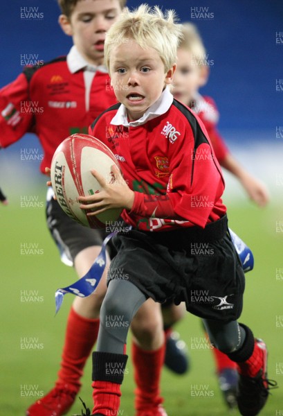 22.10.10.. Cardiff Blues v Scarlets, Magners League. Action from half-time Tag match between Dowlais RFC (red and black) and Llantwit Major RFC             