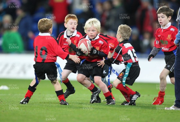 22.10.10.. Cardiff Blues v Scarlets, Magners League. Action from half-time Tag match between Dowlais RFC (red and black) and Llantwit Major RFC             