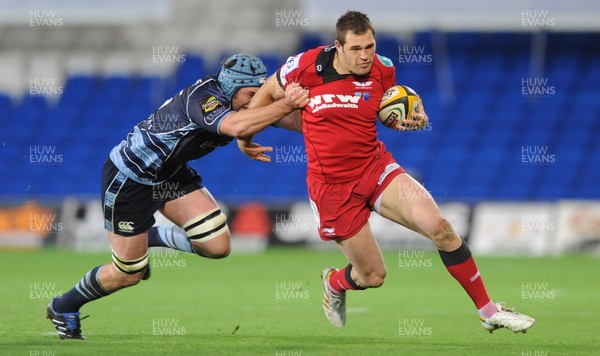 22.10.10 - Cardiff Blues v Scarlets - Magners League - Sean Lamont of Scarlets is tackled by Michael Paterson of Blues. 