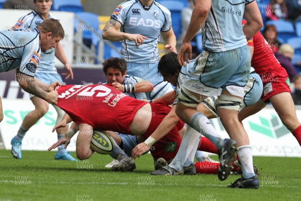 23.10.11 - Cardiff Blues v Scarlets - LV= Cup Scarlets' Damien Welch is stopped short of the Blues line 