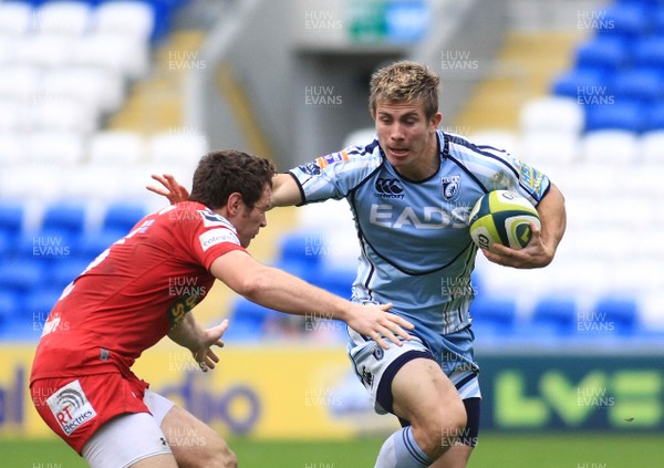 23.10.11 Cardiff Blues v Scarlets - LV=Cup - Blues' Richard Mustoe takes on Scarlets' Adam Warren 