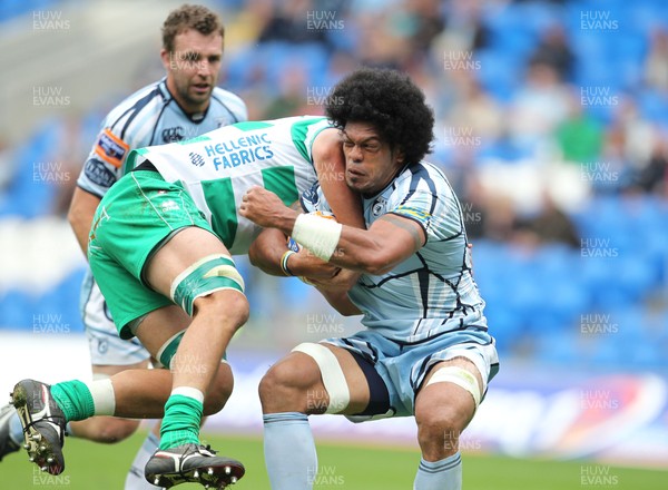 11.09.11 Cardiff Blues v Treviso... Blues Maama Molitika is tackled by Monoa Vosawai. 