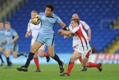 26.03.10 - Cardiff Blues v Ulster - Magners League - Blues' Casey Lualala gets away from Ulster's Paul Marshall(r). 