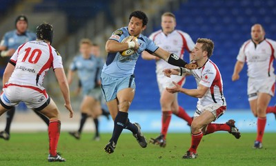 26.03.10 - Cardiff Blues v Ulster - Magners League - Blues' Casey Lualala gets away from Ulster's Paul Marshall(r). 