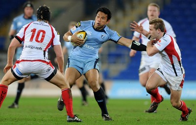 26.03.10 - Cardiff Blues v Ulster - Magners League - Blues' Casey Lualala gets away from Ulster's Paul Marshall(r). 