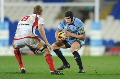 26.03.10 - Cardiff Blues v Ulster - Magners League - Blues' Tom James takes on Ulster's Chris Henry(8). 