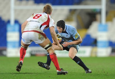 26.03.10 - Cardiff Blues v Ulster - Magners League - Blues' Tom James takes on Ulster's Chris Henry(8). 