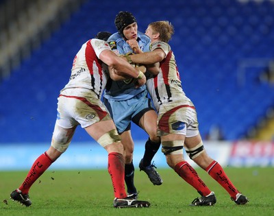 26.03.10 - Cardiff Blues v Ulster - Magners League - Blues' Tom James is tackled by Ulster's Dan Tuohy and Chris Henry. 