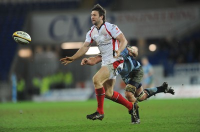 26.03.10 - Cardiff Blues v Ulster - Magners League - Ulster's Simon Danielli is tackled by Blues' Xavier Rush. 