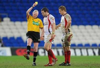 26.03.10 - Cardiff Blues v Ulster - Magners League - Ulster's Darren Cave(centre) is sin binned for a trip on Blues' Leigh Halfpenny. 