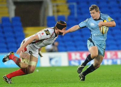 26.03.10 - Magners League Rugby, Cardiff Blues v Ulster Rugby Blues' Ben Blair is challenged by Ulster's Stephen Ferris 