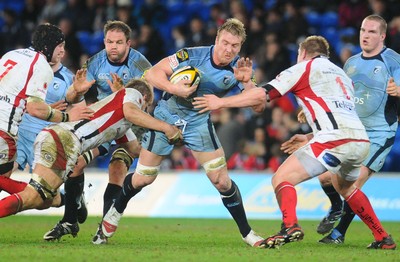 26.03.10 - Magners League Rugby, Cardiff Blues v Ulster Rugby Blues' Andy Powell tries to get past Ulster's Chris Henry and Tom Court 