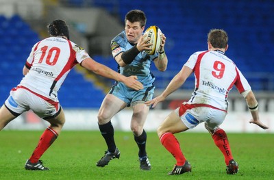 26.03.10 - Magners League Rugby, Cardiff Blues v Ulster Rugby Blues' Ceri Sweeney is challenged by Ulster's Niall O'Connor and Paul Marshall 