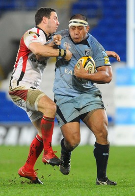 26.03.10 - Magners League Rugby, Cardiff Blues v Ulster Rugby Blues' Taufa'au Filise is challenged by Ulster's Paddy Wallace 