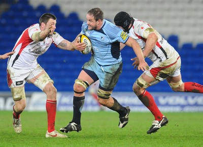 26.03.10 - Magners League Rugby, Cardiff Blues v Ulster Rugby Blues' Xavier Rush tries to get through 