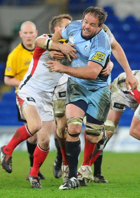 26.03.10 - Magners League Rugby, Cardiff Blues v Ulster Rugby Blues' Xavier Rush tries to get through 