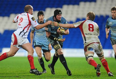 26.03.10 - Magners League Rugby, Cardiff Blues v Ulster Rugby Blues' Scott Morgan is challenged by Ulster's Rory Best and Chris Henry 