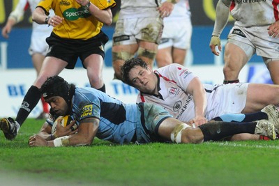 26.03.10 - Magners League Rugby, Cardiff Blues v Ulster Rugby Blues' Maama Molitika scores try despite the efforts of Ulster's Declan Fitzpatrick 