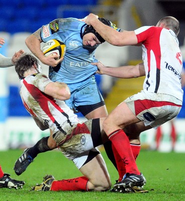 26.03.10 - Magners League Rugby, Cardiff Blues v Ulster Rugby Blues' Tom James is challenged by Ulster's Andrew Trimble and Ulster's Rory Best 