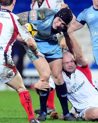 26.03.10 - Magners League Rugby, Cardiff Blues v Ulster Rugby Blues' Tom James is tackled by Ulster's Rory Best 