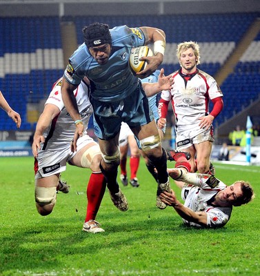 26.03.10 - Magners League Rugby, Cardiff Blues v Ulster Rugby Blues' Maama Molitika is tackled just short of the try line by Ulster's Ed O'Donoghue and Paul Marshall 