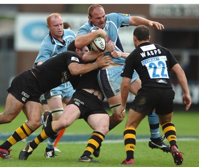 300906  Cardiff Blues v Wasps  Blues Mark Lewis is beaten by numbers  