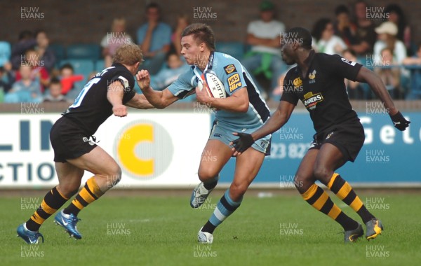 300906 - Cardiff Blues v London Wasps - EDF Energy Cup - Cardiff Arms Park - Blues' Chris Czekaj takes on Josh Lewsey(rt) and Paul Sackey 