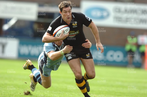 300906  Cardiff Blues v Wasps  Wasps Tom Voyce is tackled by Tom Shanklin  