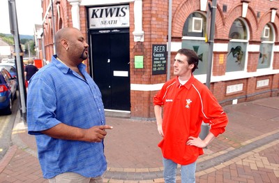 020703 - Kyoni! Ho Gaya Na Pyar (Love Has Finally Happened) Filming - Neath resident Wes Dazely (rt) chats to Cam from the Bollywood film crew in Neath town centre