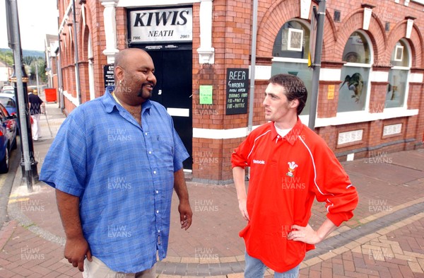 020703 - Kyoni! Ho Gaya Na Pyar (Love Has Finally Happened) Filming - Neath resident Wes Dazely (rt) chats to Cam from the Bollywood film crew in Neath town centre