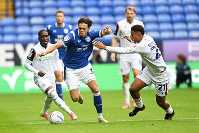 120926 - Bolton Wanderers v Cardiff City - Sky Bet Championship - Perry NG of Cardiff City is challenged by Ethan Erhahon of Bolton
