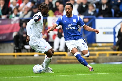 120926 - Bolton Wanderers v Cardiff City - Sky Bet Championship - Chris Willock of Cardiff City is challenged by Samuel Iling-Junior of Bolton