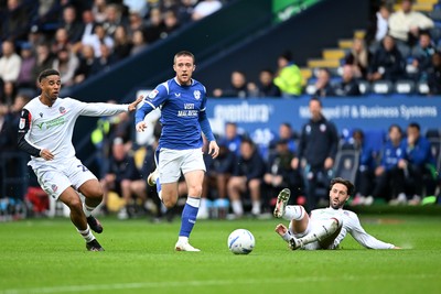 120926 - Bolton Wanderers v Cardiff City - Sky Bet Championship - Josh Sheehan of Bolton attempts a slide tackle on Jack Moylan of Cardiff City