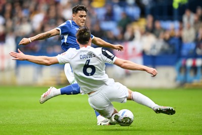 120926 - Bolton Wanderers v Cardiff City - Sky Bet Championship - Alex Robertson of Cardiff City is challenged by Ben Davies of Bolton