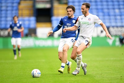 120926 - Bolton Wanderers v Cardiff City - Sky Bet Championship - Ollie Tanner of Cardiff City is challenged by Ben Davies of Bolton