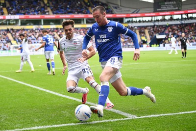 120926 - Bolton Wanderers v Cardiff City - Sky Bet Championship - Jack Moylan of Cardiff City is challenged by Max Conway of Bolton