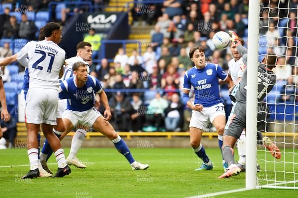 120926 - Bolton Wanderers v Cardiff City - Sky Bet Championship - Krystian Bielik of Cardiff City heads a shot at Gavin Bazunu of Bolton