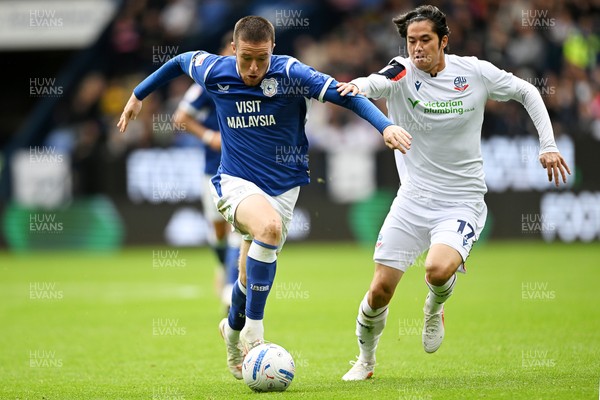 120926 - Bolton Wanderers v Cardiff City - Sky Bet Championship - Jack Moylan of Cardiff City is challenged by Atsuki Ito of Bolton
