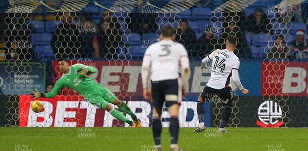 231217 - Bolton Wanderers v Cardiff City - SkyBet Championship - Gary Madine of Bolton puts away the penalty past Neil Etheridge of Cardiff