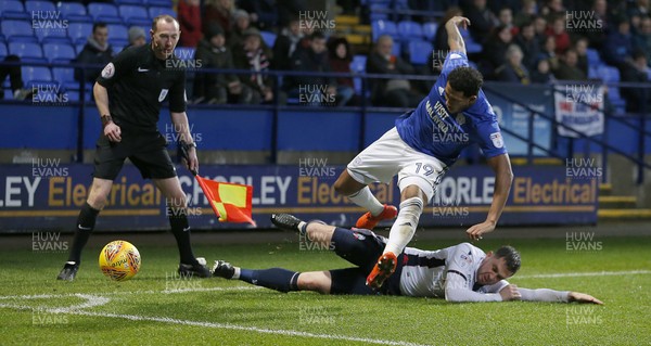 231217 - Bolton Wanderers v Cardiff City - SkyBet Championship - Andrew Taylor of Bolton takes out Nathaniel Mendez-Laing of Cardiff