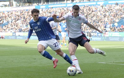 251025 - Bolton Wanderers v Cardiff City - Sky Bet League 1 - Eoin Toal of Bolton clears from Yousef Saleh of Cardiff in the box
