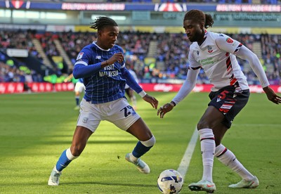 251025 - Bolton Wanderers v Cardiff City - Sky Bet League 1 - Tanaswa Nyakuhwa of Cardiff and Richard Taylor of Bolton