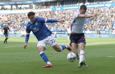 251025 - Bolton Wanderers v Cardiff City - Sky Bet League 1 - Eoin Toal of Bolton clears from Yousef Saleh of Cardiff in the box