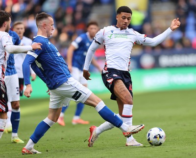 251025 - Bolton Wanderers v Cardiff City - Sky Bet League 1 - David Turnbull of Cardiff and Mason Burstow of Bolton