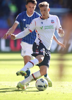 251025 - Bolton Wanderers v Cardiff City - Sky Bet League 1 - Perry Ng of Cardiff and Marcus Forss of Bolton