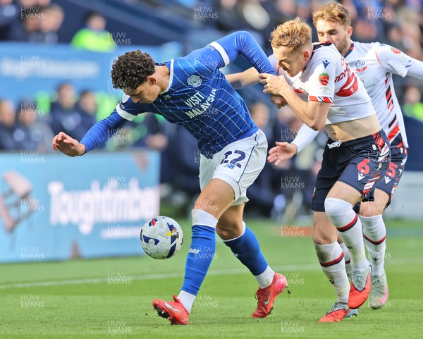 251025 - Bolton Wanderers v Cardiff City - Sky Bet League 1 - Yousef Saleh of Cardiff and George Johnston of Bolton and Richard Taylor of Bolton