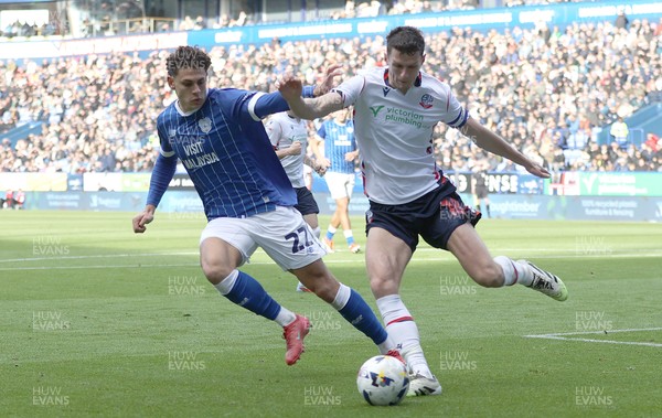 251025 - Bolton Wanderers v Cardiff City - Sky Bet League 1 - Eoin Toal of Bolton clears from Yousef Saleh of Cardiff in the box